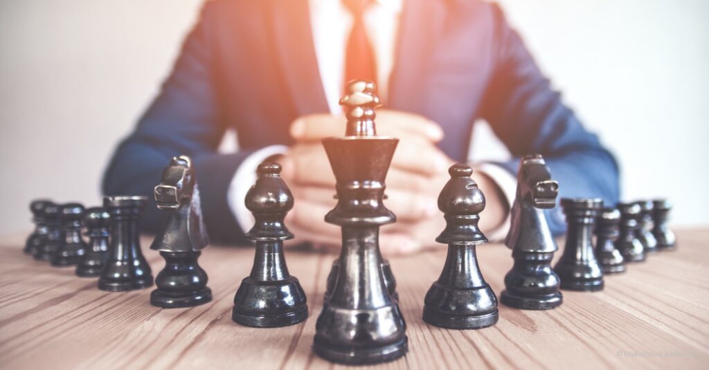 bob Business man playing chess