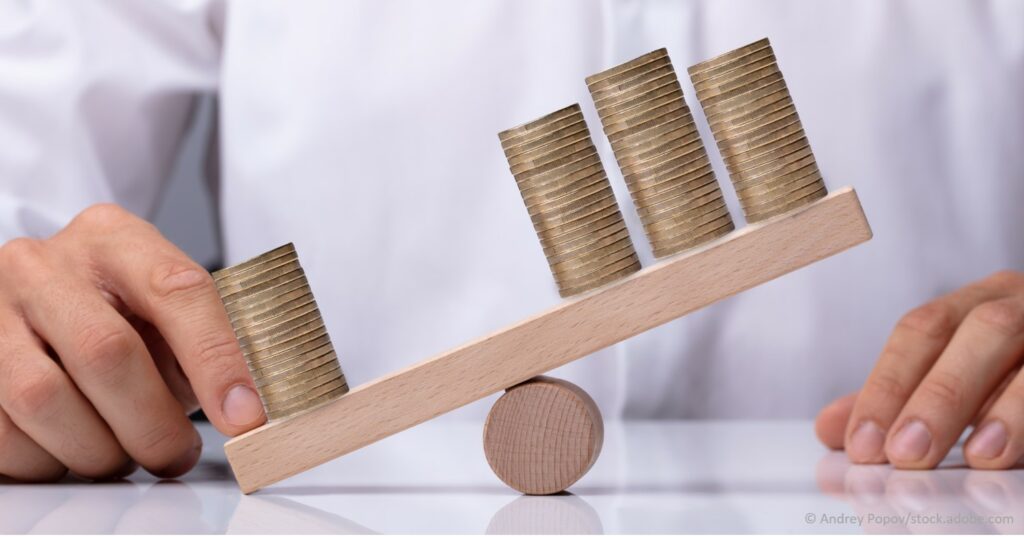 How to Maximize Profits Using Leverage business man balancing out financial risk