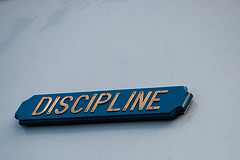 Discipline Sign On Wall