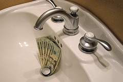 Money Going Down The Drain