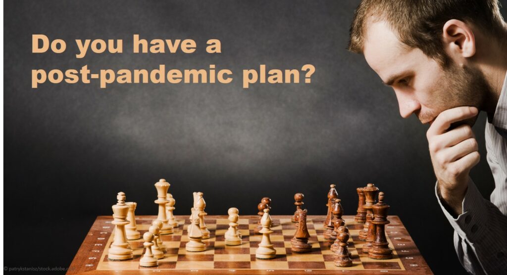 Discover the Difference Between Surviving and Thriving in a Post-Covid World businessman contemplating planning moves
