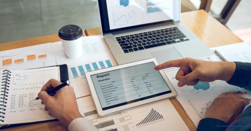 Navigate Today’s Volatile Economy With Top Financial Analysis Strategies business coworkers analyzing financial data