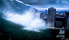 Large Cinematic Tsunami Pushing Over Buildings